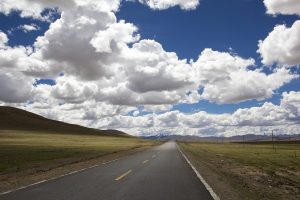 panoramic view - clouds and the road