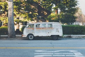 A rusty van on the street