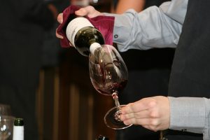Man pouring wine