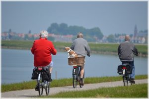 Old people on bicycles.