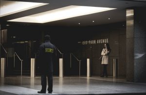 Security officer in a lobby.