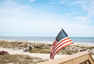 American flag on a beach.