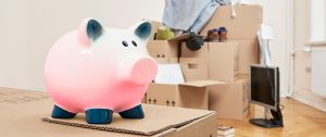 piggy bank and moving boxes