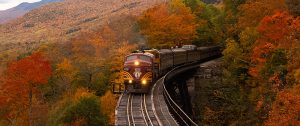 a train on rails in the fall