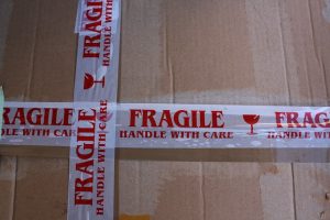 A box taped with labeled tape
