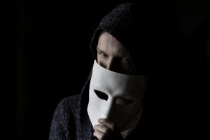 Scammer with a mask