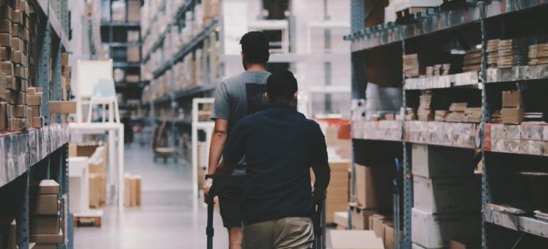 two people in a warehouse