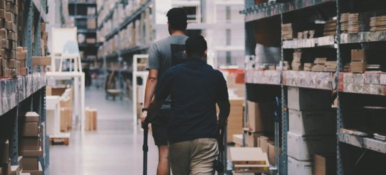 two people at the storage, warehouse