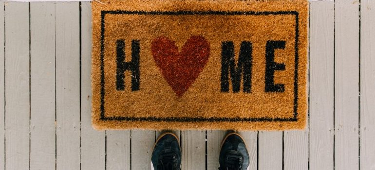 residential movers Jupiter FL - a welcome mat leading to your new home