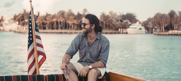 A guy sitting on a boat
