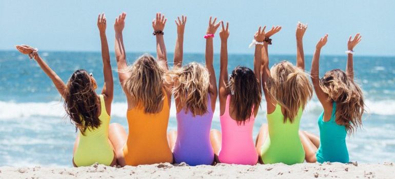 Girls on the beach - local moving companies Coral Springs FL