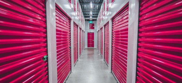 Storage unit with pink sliding doors.