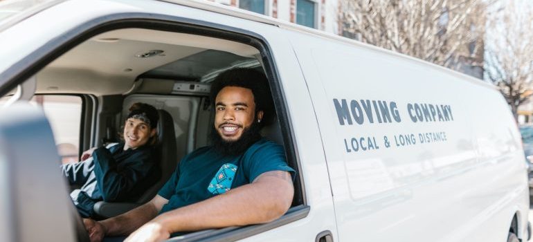 Movers in a moving van.