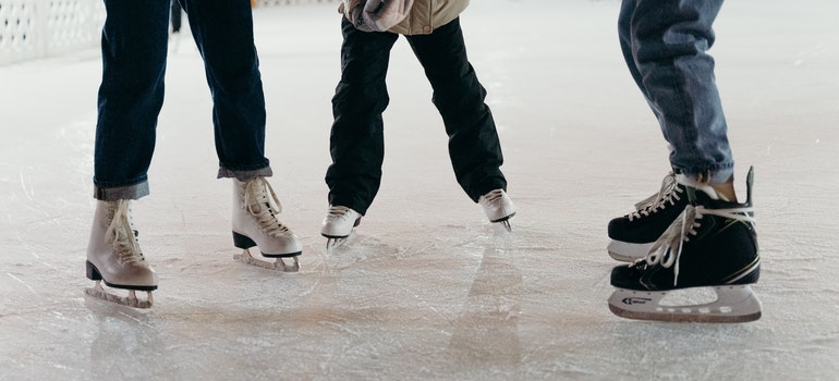 People Ice Skating Together.
